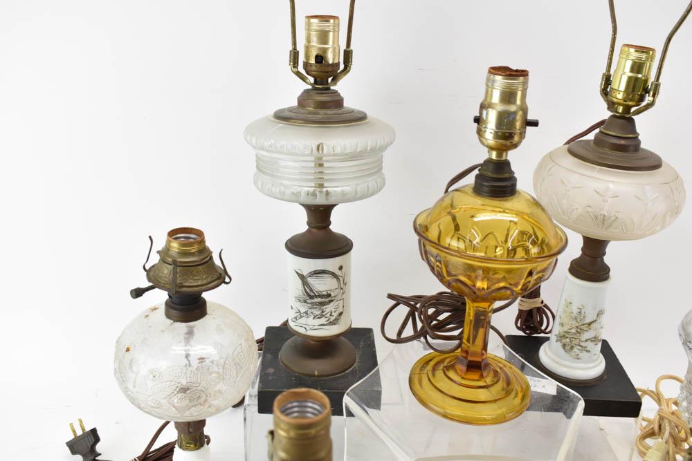 Group of Antique Assorted Oil Lamps: Group of Antique Assorted Oil Lamps. Electrified. Condition: Used, wear and worn