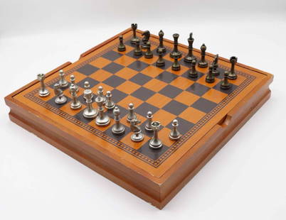 Modern Metal Chess Set with Wooden Board: Modern Metal Chess Set with Hollow Wooden Board Full set, all pieces included. Scratches to board. Pieces in good condition. Board approx. 12" x 12". King approx 2"h and pawn approx. 1.25"h