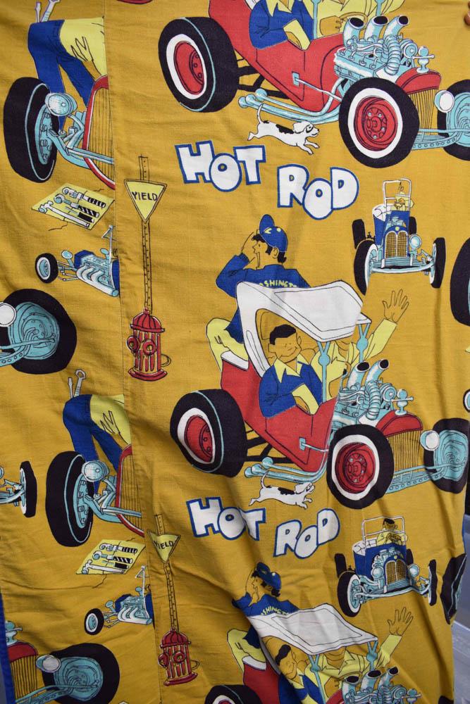 Pair of Vintage Hot Rod Kid's Twin Bedspreads: Pair of Vintage Hot Rod & Drag Strip Kid's Twin Bedspreads with Car motif, c. 1960's; used condition, each measure approx. 92" long x 56" wide