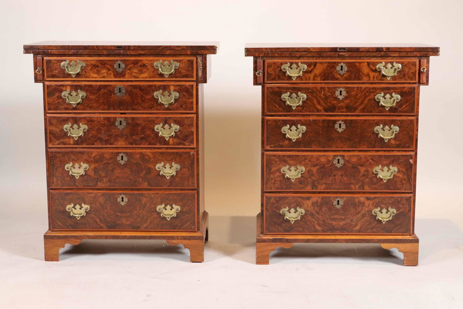 George III Style Burl-Veneered Bachelor's Chests: English Taste, 20th C., 2 pieces total 32"h x 27-1/2"w x 13"d Provenance: Property from a New York City Gentleman