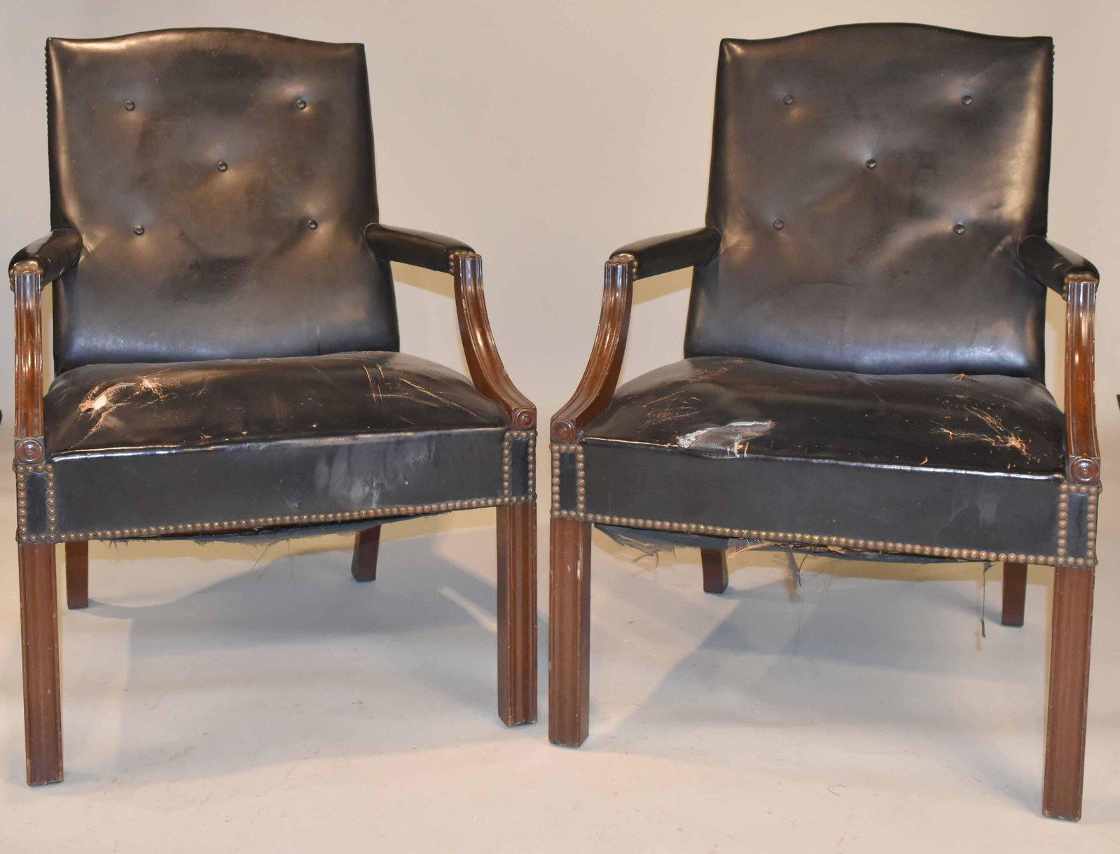 Pair of George III Style Mahogany Library Chairs: Leather upholstery distressed. 35-3/4"h