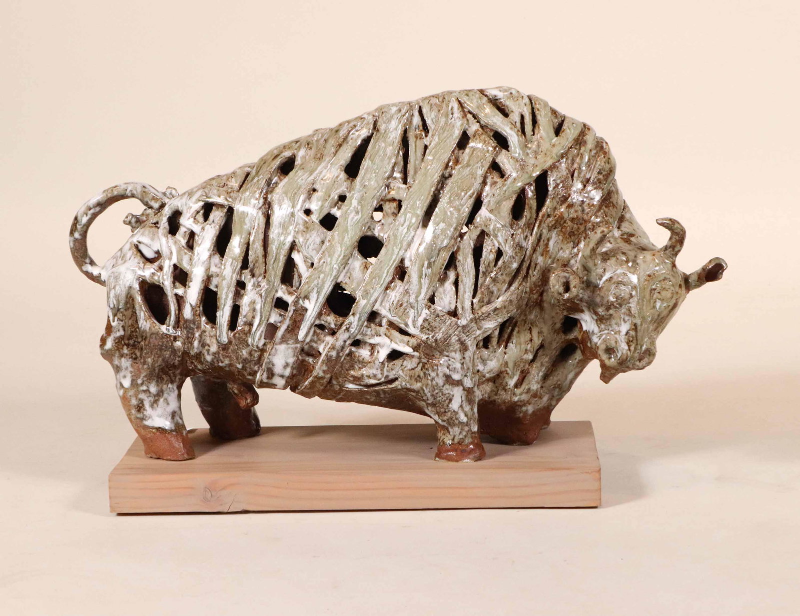 Zolan Kiss, Ceramic Bull: Ceramic and metal sculpture on wooden base Bull: 14"h x 24"w Base: 18"l x 8"w