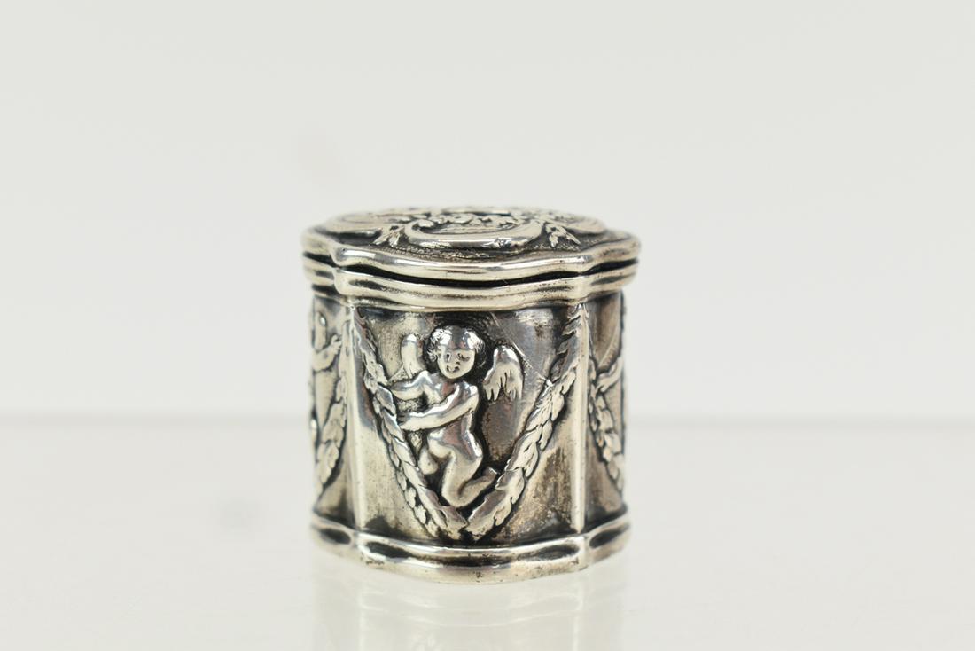 Victorian Silver Cherub Decorated Pill Box: Victorian Silver Cherub Decorated Pill Box Used condition Appx. 1-1/4"h x 1 1/4"w x 1"d