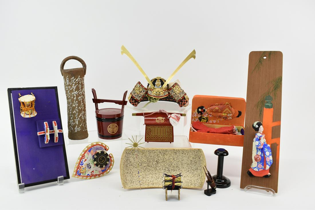 Group of Japanese Decorative Objects: Group of Japanese Decorative Objects, including an unusual stoneware wall hanging flower holder, and a miniature replica of a samurai helmet