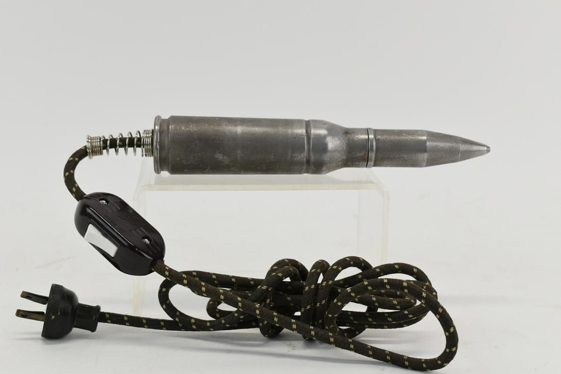 Bullet Form Faux Wired Trench Art Sculpture: Bullet Form Faux Wired Trench Art Sculpture having the appearance of a 25mm bullet with electrical cord attached at bottom Used condition, wear, worn, surface distress, scratches Bullet size 8-1/2"l x