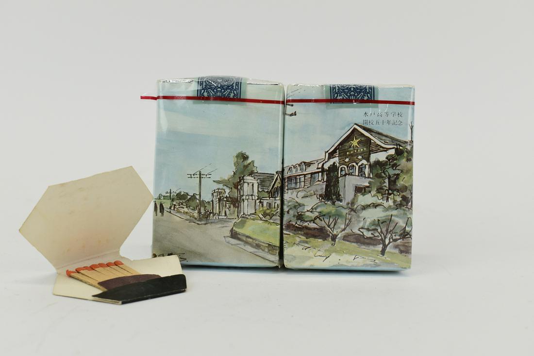 Two Packs of Japanese Hi-Lite Cigarettes: Two Packs of Japanese Hi-Lite Cigarettes, both unopened, in their original cellophane with tax stamps, together with a period book of Japanese matches, 3 pieces total