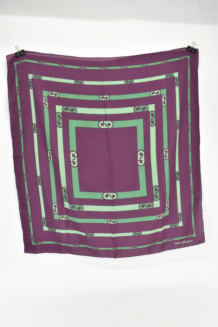 Salvatore Ferragamo Silk Purple and Green Scarf: Salvatore Ferragamo Silk Purple and Green Scarf featuring interlocking F links and having hand rolled edges Used condition, stains, in need of cleaning Appx. 34" x 35"
