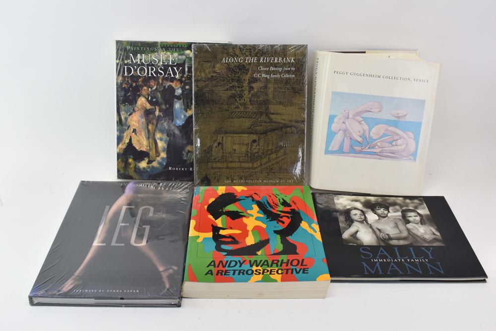 Group of Vintage Assorted Books: Group of Vintage Assorted Books including Andy Warhol a retrospective, Paintings in The Musee D'Orsay by Robert Rosenblum, Along the Riverbank collection of Chinese paintings, Peggy Guggenheim Collect
