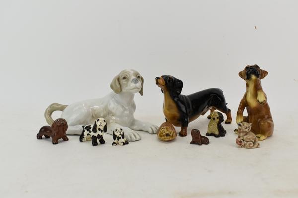 Group of Assorted Animal Ceramic Figurines: Group of Assorted Animal Ceramic Figurines including eight dog figurines from various artists, and one hedgehog, various makers including, Wade, and Mortens Studio. Used condition, wear, worn, surface