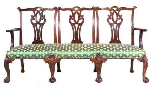 George III Style Triple Chair-Back Settee: Possibly Irish, 19th/20th C., made of carved mahogany38-1/2"h x 72-1/2"w x 22"dProvenance: Nadeau's Auction Gallery, Estate of Paul Koda Sale, Lot 301, September 29th, 2001 (Sold $6500)