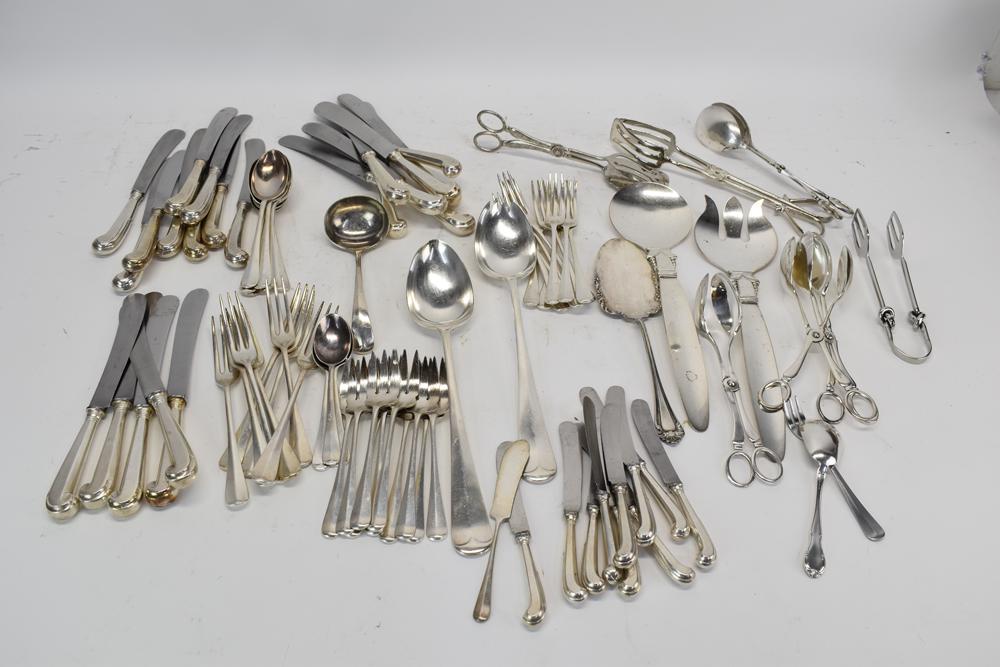 Large Group of Assorted Silver Plate: Large Group of Assorted Silver Plate including Sheffield England flatware, Simeon L. and George H. Rogers Company, Raimond, Gorham, comprising of forks, knives, spoons, serving utensils, ladles and mo