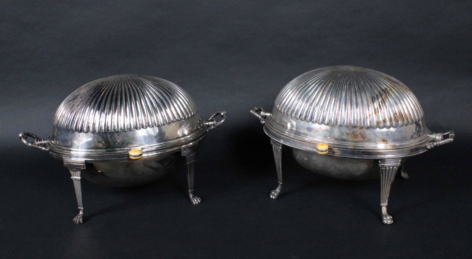 Two English Dome Warming Dishes: Two English Dome Warming Dishes, 19th/20th C., electroplated, having makers mark G & S, 9"h x 16"w with reticulated insert. The second one, Having William Hutton & Sons makers mark, is more ornate wit