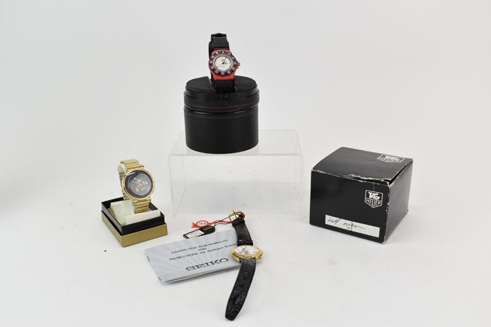 Mickey Mouse Watches & Tag Heuer Sports Watch: Mickey Mouse Watches & Tag Heuer Sports Watch. Seiko Mickey Mouse with tags attached, black leather strap, appears never to have been worn. Pulsar Mickey Mouse watch with gold band, some wear, light s