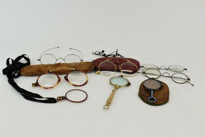 Group of Pince Nez and Eyeglasses: Group of Pince Nez and Eyeglasses, various states of condition, most with wear, some with losses, nicks, chips, surface wear. Cases accompany one pair pince nez, one lorgnette, and one wire rimmed spe