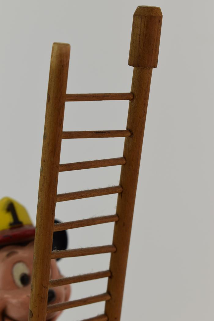 Mickey Mouse Wind Up Ladder Climber Toy: Mickey Mouse Wind Up Ladder Climber Toy (marked "Walt Disney Productions") with on/off switch together with wooden ladder on platform Used condition, wear/worn, surface distress, Mickey is missing lef