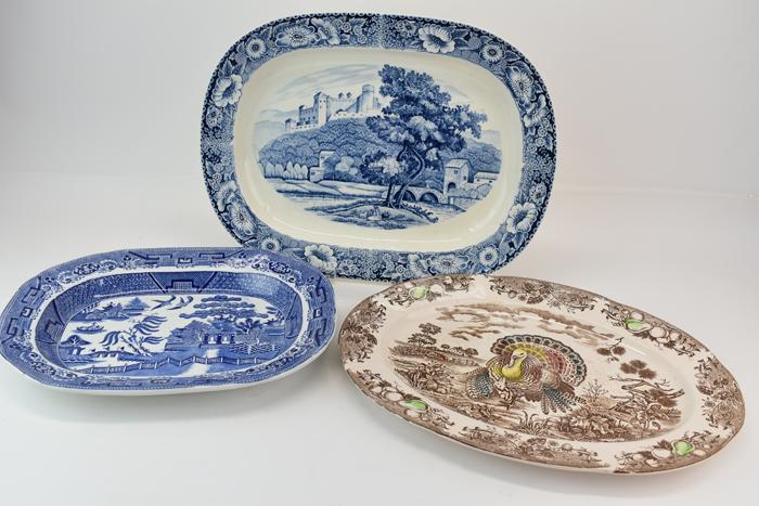 Three Assorted Vintage Transferware Platters: Three Assorted Vintage Transferware Serving Platters including a Royal Delft blue and white, Staffordshire blue and white and a Japanese sepia tone turkey platter Used condition, wear, worn, surface d