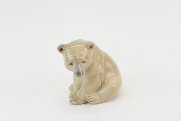 Lladro Recumbent Polar Bear Figurine: Lladro Recumbent Polar Bear Figurine Overall good condition, having no chips, cracks, or repairs 3-1/2"h x appx. 3-3/8" at widest