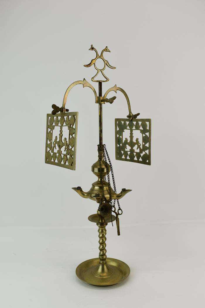 Antique Four Light Brass Lucerna Oil Lamp: Antique Four Light Brass Lucerna Oil Lamp having double headed bird finial and crowned lion crest designed brass shades Used condition, wear, worn, surface distress, wax residue Appx. 21"h x 10-1/2"w 
