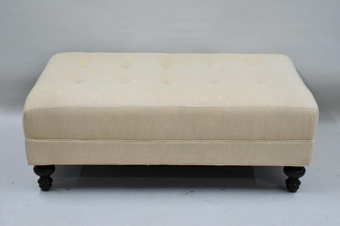 Beige Upholstered Tufted Ottoman: Beige Upholstered Tufted Ottoman Pottery Barn Mitchell Gold & Bob Williams label Used condition, wear/worn, some areas of stain. 11-1/8"h x 49-1/2"l x 31-1/8"w