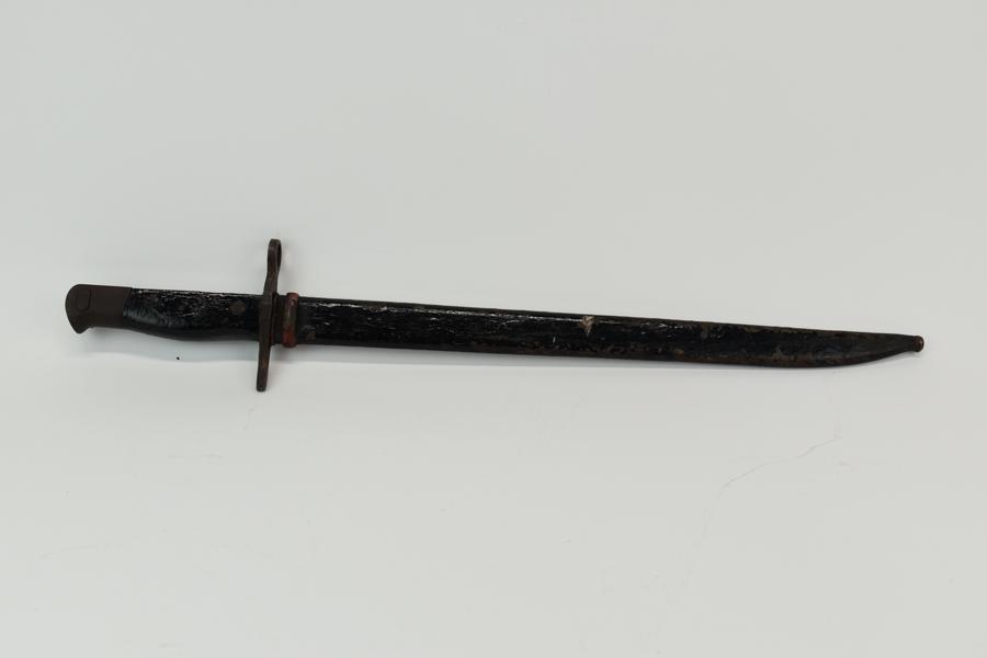 Military Bayonet and Sheath: 20th Century Military Bayonet having painted black and red sheath, handle stamped "287"; used condition, wear/worn, surface distress, rust, paint losses, blade has never been sharpened; measures appro