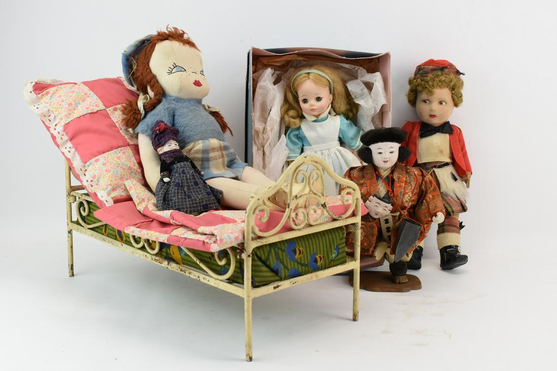 Lenci Style Felt Scottish Girl Doll: Lenci Style Felt Scottish Girl Doll together with a Madame Alexander "Alice" doll in box, a cloth red headed doll, an Asian doll, and small vintage bisque doll with doll bed. Wear, losses, surface dis