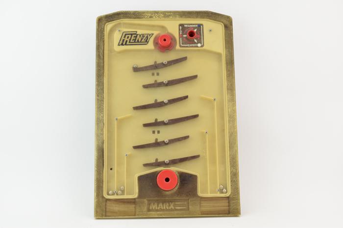 Frenzy Game by Marx 1974 Pinball Balance: Frenzy Game by Marx 1974 Pinball Balance General wear, hasn't been cleaned, some losses to include decals from face denoting points. 20-7/8"h x 14"w x 2"d