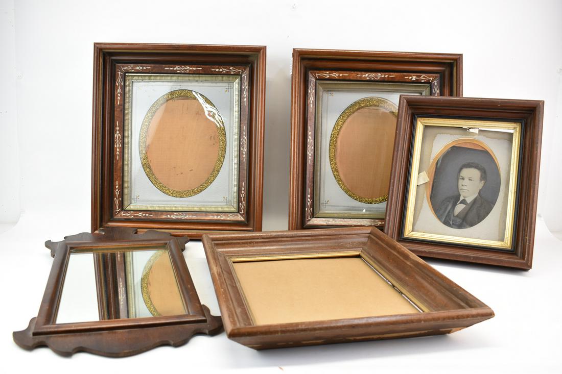 Four Wood Picture Frames: Four Wood Picture Frames including a pair, one with photograph. Together with a Chippendale style mirror. Used condition, wear/worn. Pair: 17-1/2"h x 15-1/2"w x 4"d