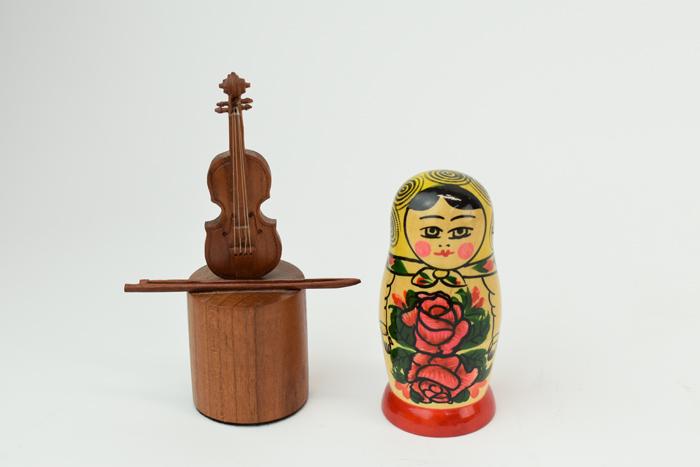 Vintage Nesting Doll and Wood Carved Violin: Vintage Nesting Doll and Wood Carved Violin. Russian style nesting doll having 4 dolls, the violin wooden sculpture signed D.W. Stevens on back. Used condition Violin sculpture: 5"h x 2-5/8"dia at bas