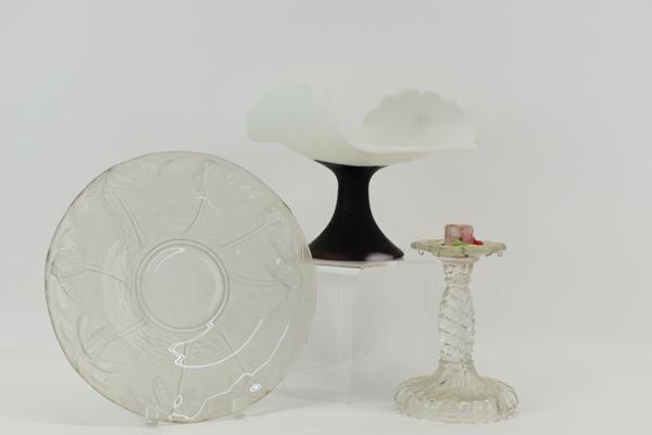 Art Glass Footed Basket Centerpiece: Art Glass Footed Basket Centerpiece having white glass basket above burgundy glass single pedestal. Together with a colorless glass palm tree design plate and a single glass candle stick missing hangi