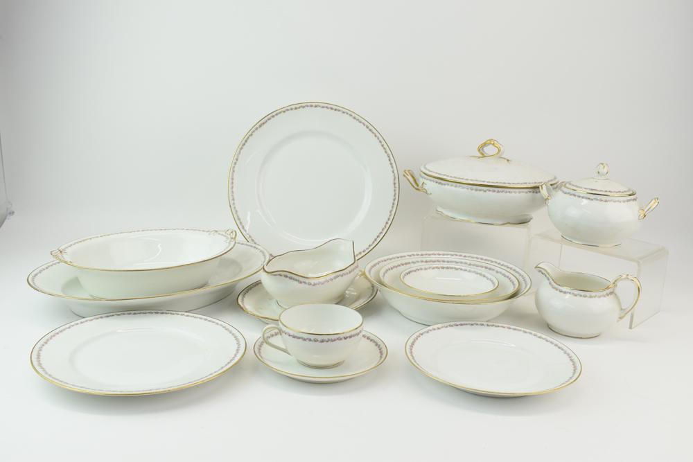 C. Ahrenfeldt Limoges France Dinnerware Service: C. Ahrenfeldt Limoges France Dinnerware Service, floral rose decorated, comprising 12 10-3/8" dinner plates (1 chipped), 1 creamer, sugar, gravy boat, platter, tureen, 2 serving bowls, 12 berry bowls 