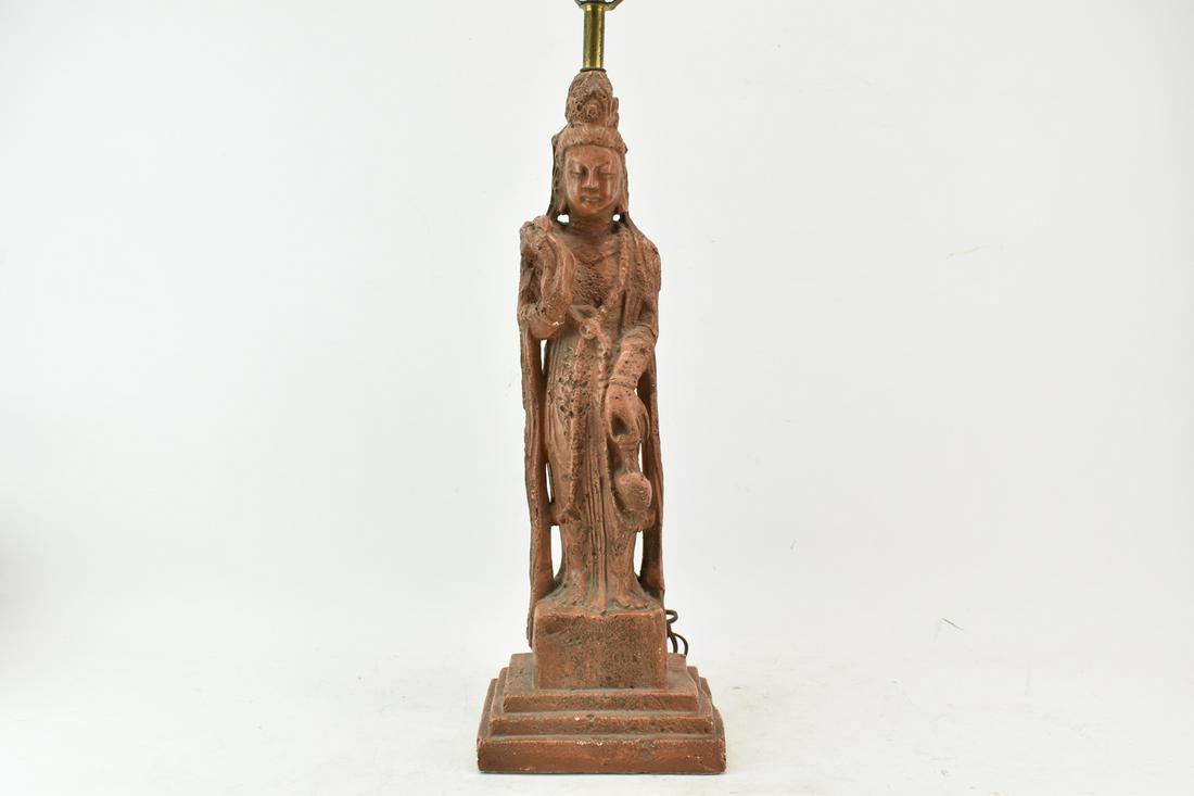 Composition Asian Rust-Orange Figural Lamp: Composition Asian Rust-Orange Figural Lamp made to look like a worn sandstone or other carved material. 33"h at top of harp, base 7" x 5".