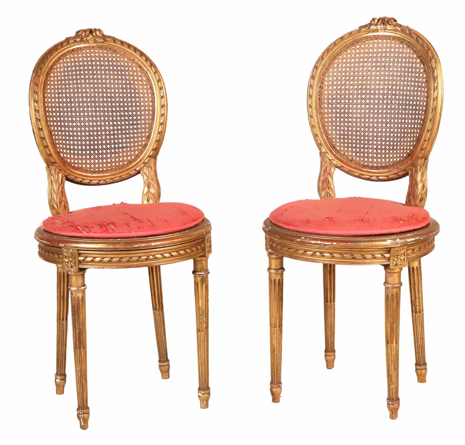 Pair of Louis XVI Giltwood Side Chairs: 19th C. with caned seats and backs, and removeable cushions. Losses and wear. 35-1/2"h x 16-1/2"w x 16-1/2"d