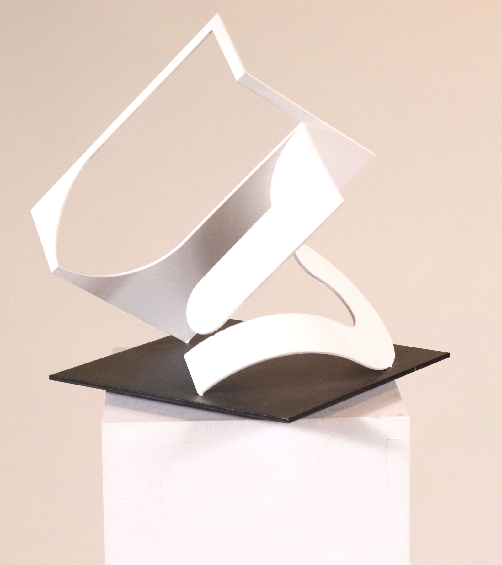 Fletcher Benton, "U": (American, 1931-2019) 2004, welded metal on rotating base, signed and dated on underside 12-1/2"h x 10"w x 10"d Provenance: Property from the Estates of David and Laura Finn, Westchester County, NY