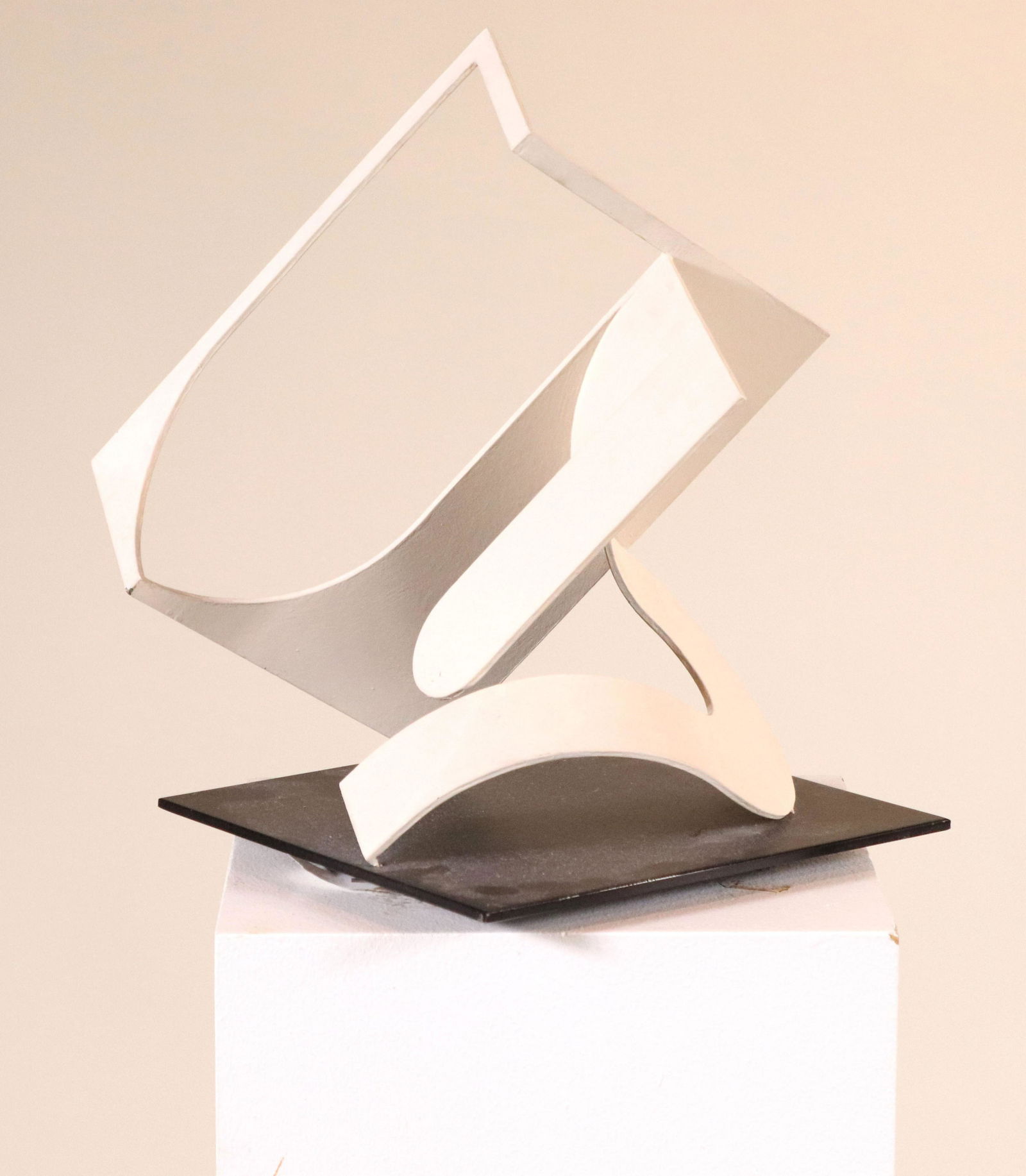 Fletcher Benton, "U": (American, 1931-2019) 1983, welded metal sculpture on rotating base, signed and dated on underside 12-1/2"h x 10"w x 10"d Provenance: Property from the Estates of David and Laura Finn, Westchester Cou