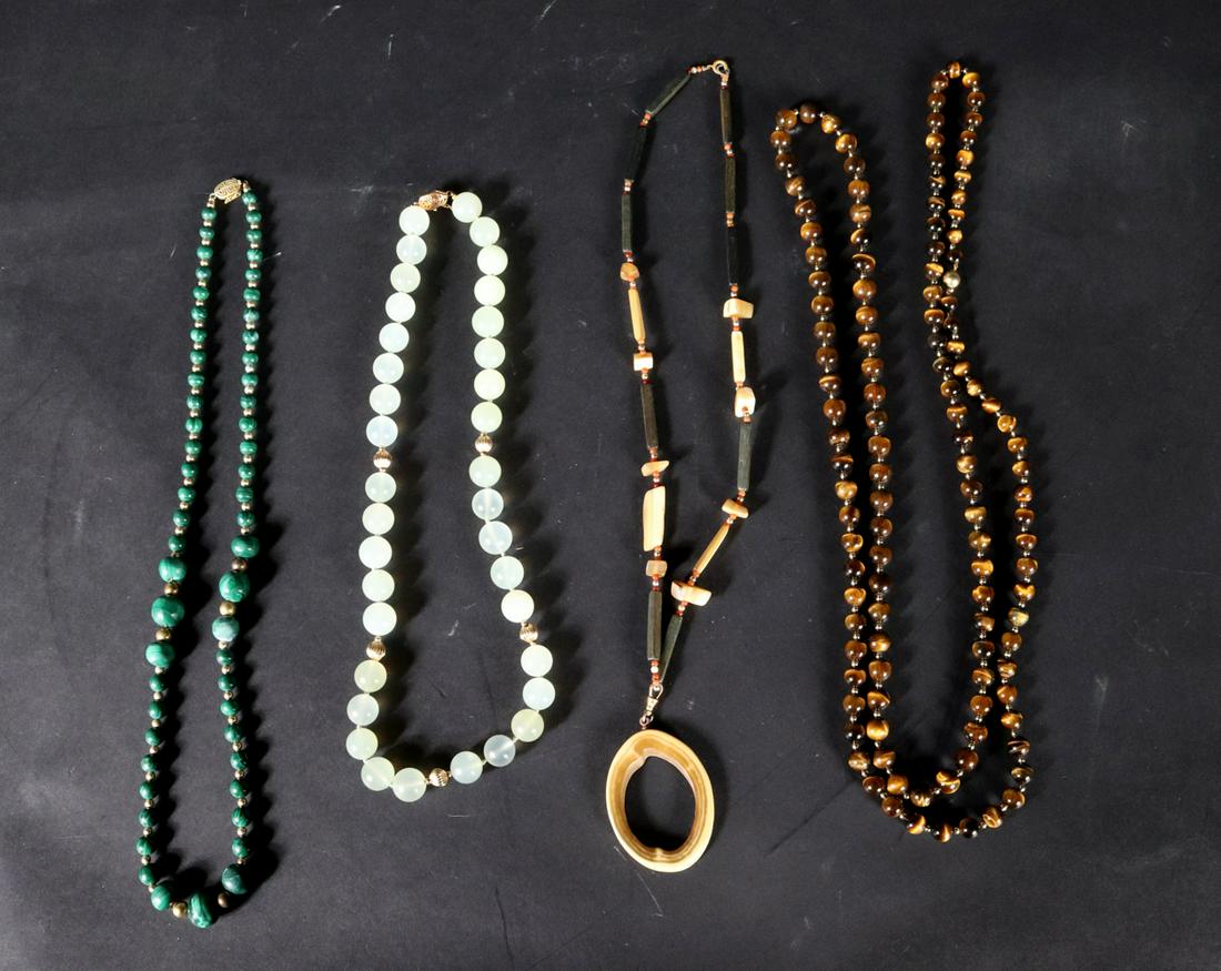 Four Vintage Hardstone and Cats Eye Necklaces: All appear to be unmarked Cats Eye necklace: 54"l Provenance: Property from the Estates of David and Laura Finn, Westchester County, NY