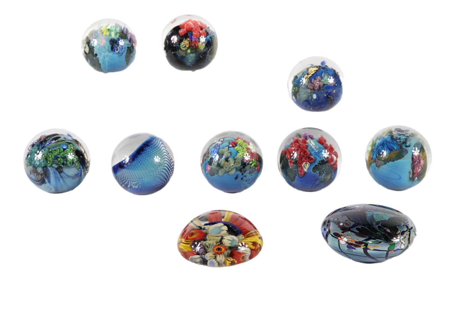 Group of Josh Simpson Glass Paperweights: (American, b. 1949) comprising eight paperweights, each signed and dated, together with two additional glass paperweights, 10 pieces total Provenance: Property from the Estates of David and Laura Finn