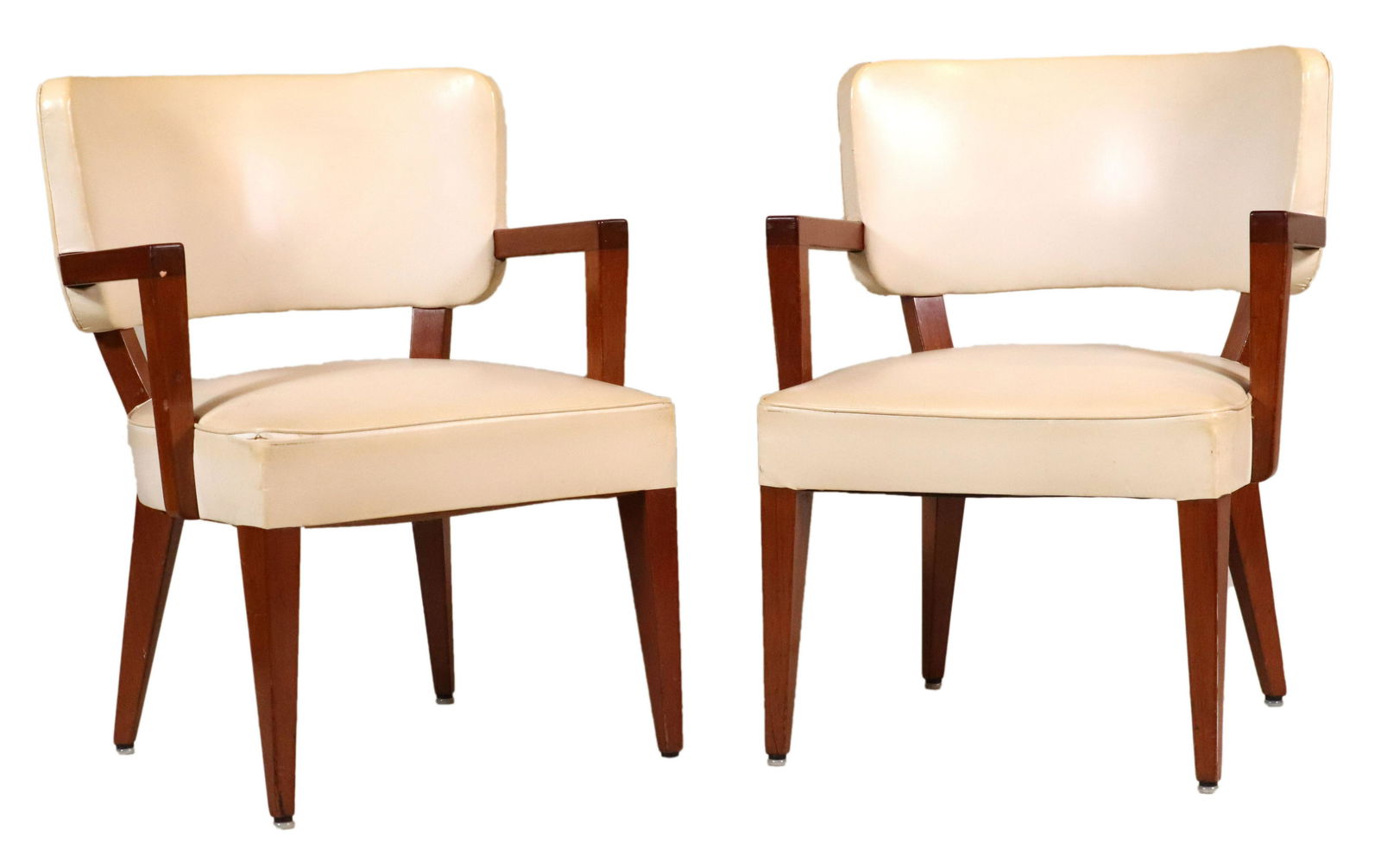 Pair of Vinyl-Upholstered Open Armchairs: In the Manner of Jules Leleu (French, 1883-1961), 20th C. Each 32"h x 24-1/2"w x 20-1/2"d, seat height 17"h Provenance: Property from the Estates of David and Laura Finn, Westchester County, NY