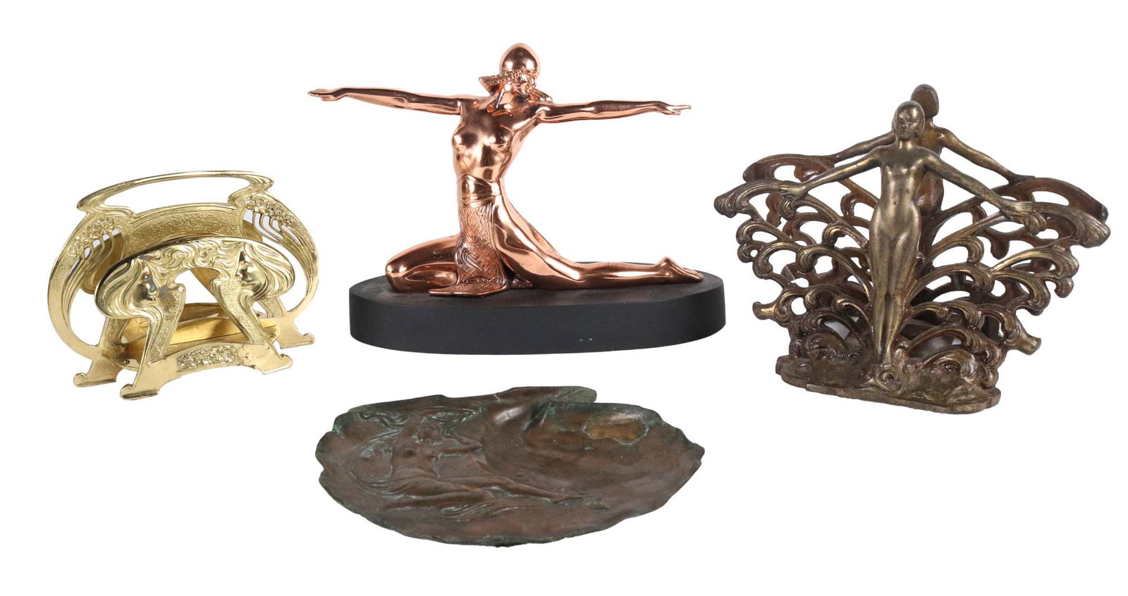 Three Art Nouveau Style Decorative Objects: Including two letter stands and a bronze tray shaped as a seashell, together with an Art Deco style copper sculpture of a dancer, 4 pieces total Provenance: Property from the Estates of David and Laur