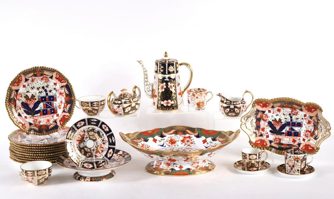 Two Large Imari Oval Footed Center Bowls: English, one marked, "Spode" 5"h x 14-1/2"l; together with and in a similar Imari pattern; a shaped serving dish marked, "Copeland's China England", (11-1/2"l), and ten similar gold rimmed luncheon pl