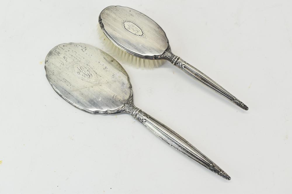 SB Sterling Silver Hand Mirror and Hairbrush Set: Vintage Saart Brothers Company Sterling Silver Hand Mirror and Hairbrush Set, having long fluted handles with other details, mirror is oval and beveled, both are monogrammed on the back in a cartouche