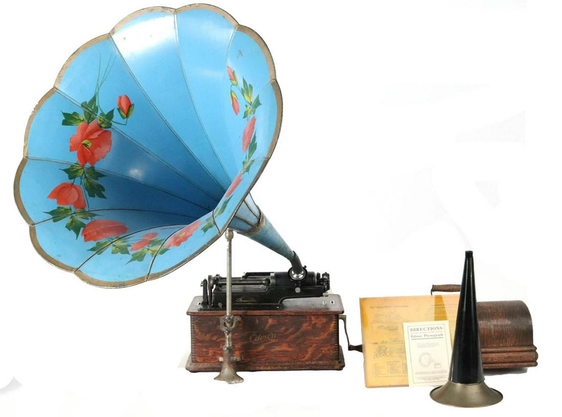 Edison Home Model "B" Phonograph: 2 minute reproducer, with original crane, original lid, an additional small witch's hat horn, and a painted blue morning glory horn with flowers, together with two Edison guides 31-1/2"h x 16"w x 9-1/