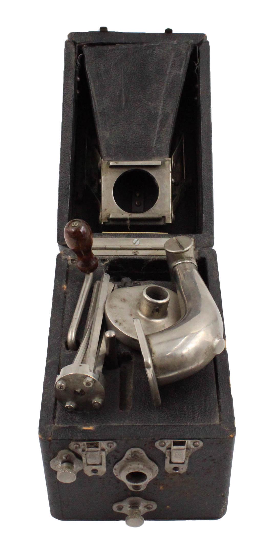 Peter Pan Portable Gramophone: ca. 1920, "cameraphone" style phonograph in black leather box, appears to be complete Appx. 5"h x 4-1/2"w x 7"d