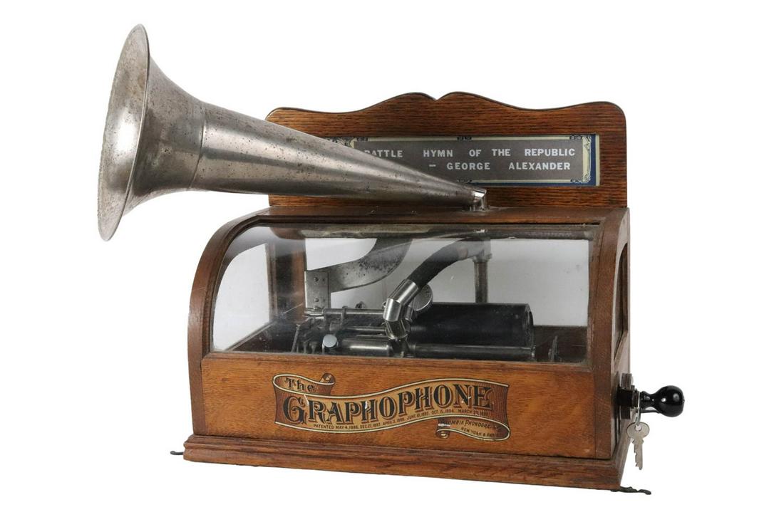 Columbia "Eagle" Type B Coin-Operated Graphophone: With eagle works, horn appears to be original, appears to be a complete machine; together with an original advertisement from "The Phonoscope", 1899 Appx. 11-1/4"h x 14-1/4"w x 8-1/4"d