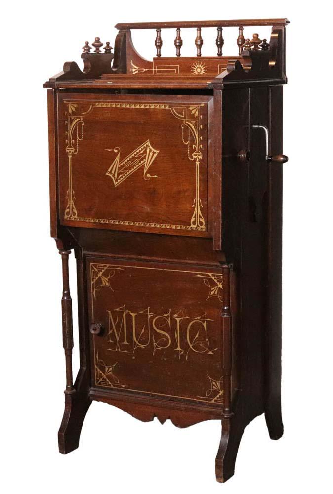 Tournaphone Floor Model Paper Roll Organ: In working condition, with 9 extra rolls 43-1/8"h x 19-1/2"w x 14-1/2"d