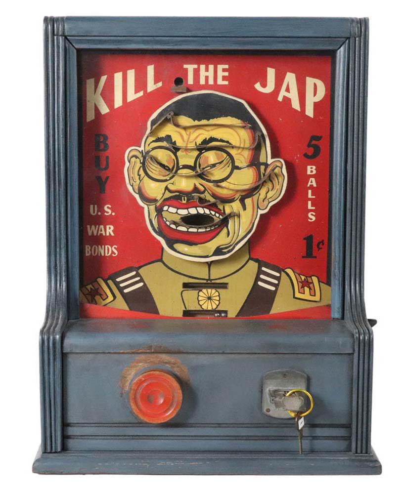 Groetchen Anti-Japanese Propaganda Game: Kill the J--, ca. 1942, 1 cent machine, in working condition, includes key; together with a framed propaganda advertisement, a War Bond ink blotter with a "Remember Pearl Harbor" button attached, and 