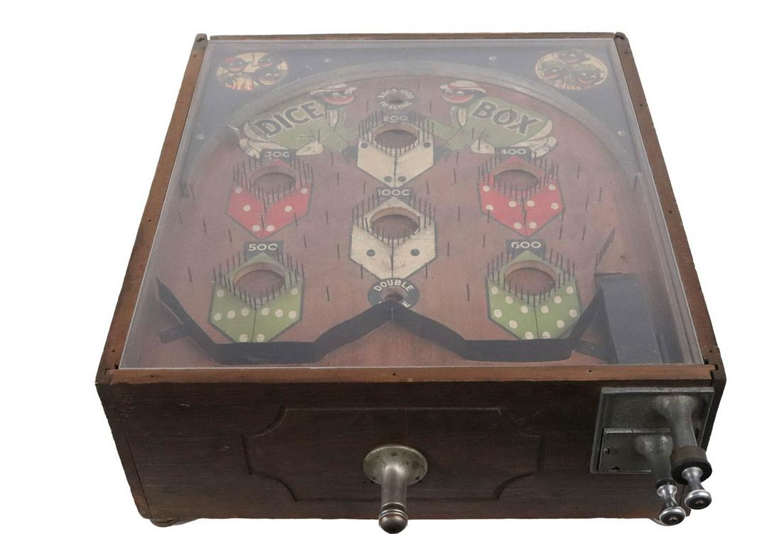 Dice Box Black Americana Coin-Operated Game: ca. 1933, tabletop version, in working condition, with key 9-1/8"h x 18-1/4"w x 19-3/4"d