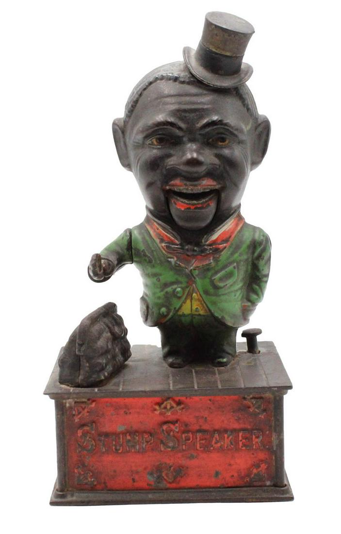 Black Americana "Stump Speaker" Mechanical Bank: Made by Shepard Hardware Co., Buffalo, NY, 1180s, retains original paint 10-5/8"h x 5"w x 4"d