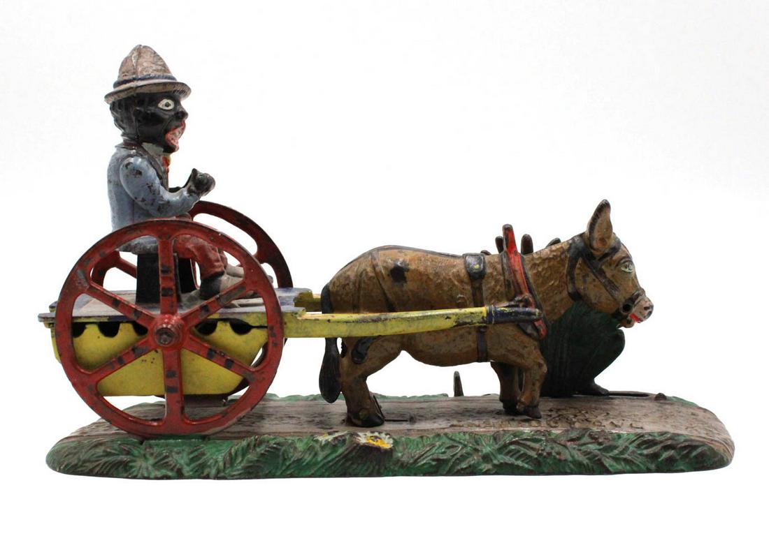 Black Americana "Bad Accident" Mechanical Bank: Made by J&E Stevens Co., Cromwell, CT, original cast iron mechanical bank in working condition with original paint 6-1/4"h x 10-1/4"w x 3"d