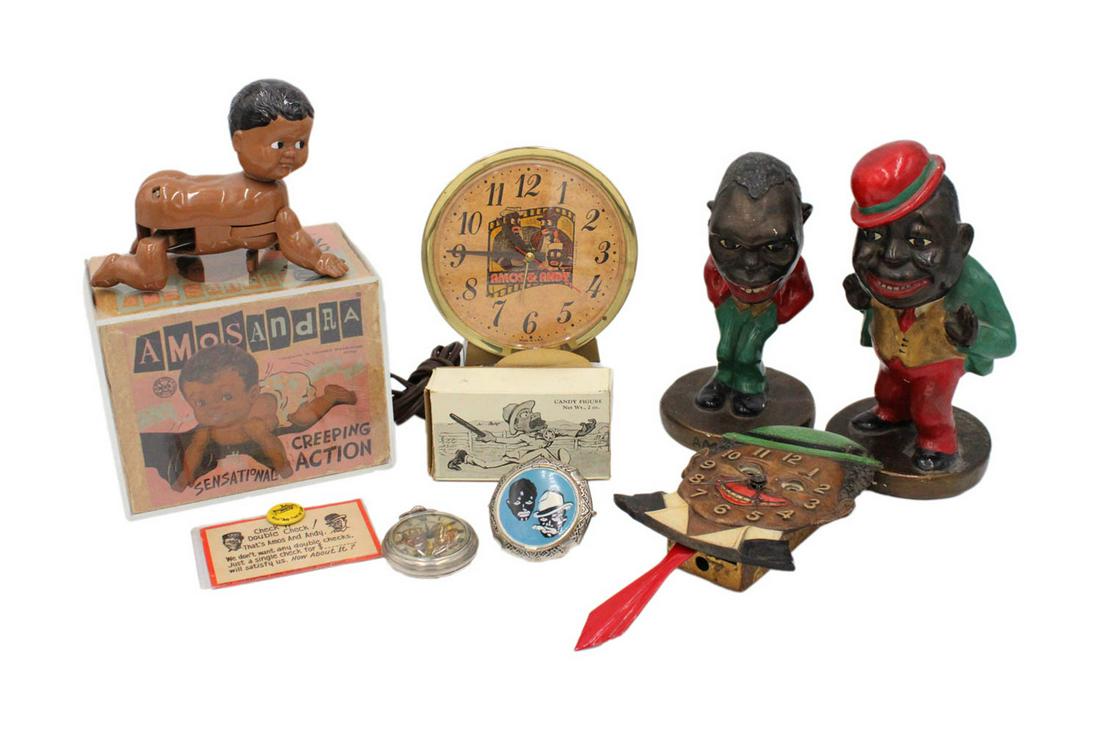 Group of Amos 'n' Andy Related Items: Including an "Amosandra" creeping doll made by Louis Marx and Co., with original box; an Amos 'n' Andy pocket watch; and Amos 'n' Andy Fresh Air Candy button and advertisement; a Wisley Candy Co. box;