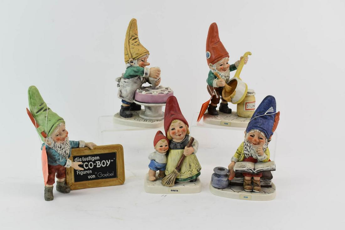 Group of Co Boy Goebel Gnome Figurines: Group of Co Boy Goebel Gnome Figurines. Comprising Bob lecturing , Tom scraping the Honey pot, Greta with young child and broom, Candy the cake maker and Goebel Gnome advertiser Used condition The lar